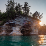 Pictured rocks national lakeshore with sun rising