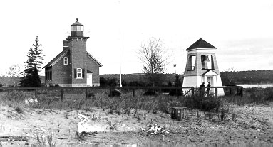 The red brick Little Traverse Lighthouse and attached keeper's dwelling on Harbor Point, near Harbor Springs, Michigan.